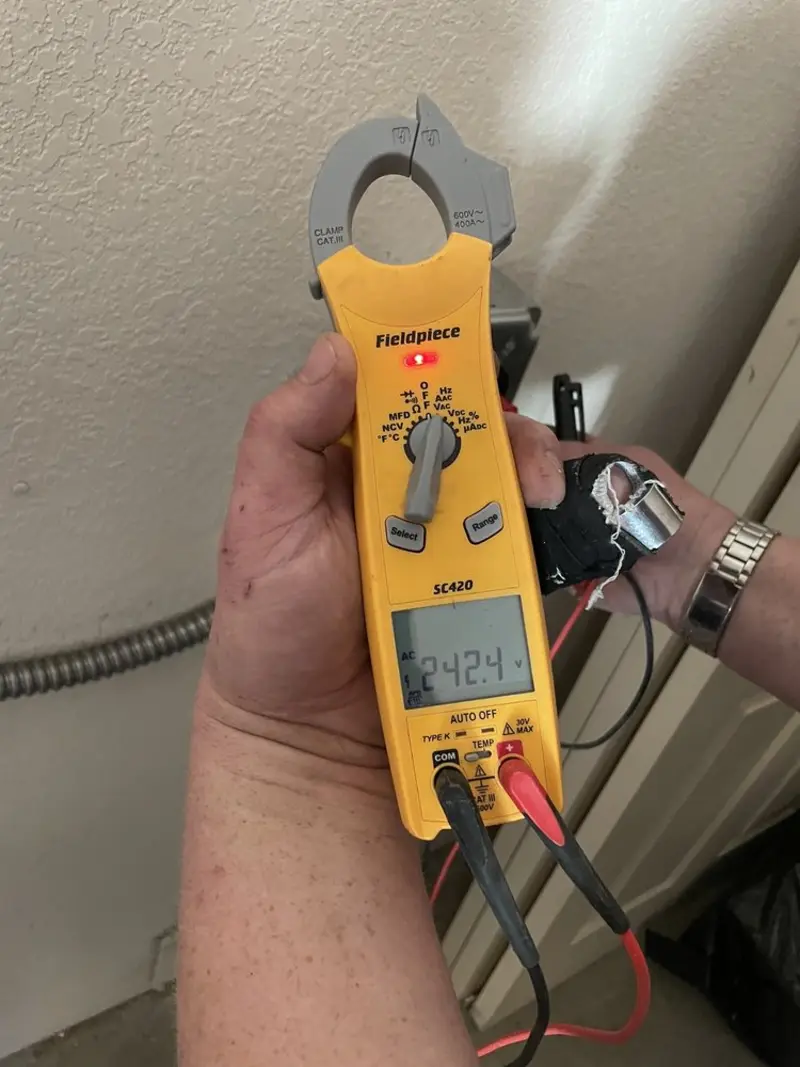 Voltage testing with clamp meter during Aluminum Wiring Replacement in Lorain